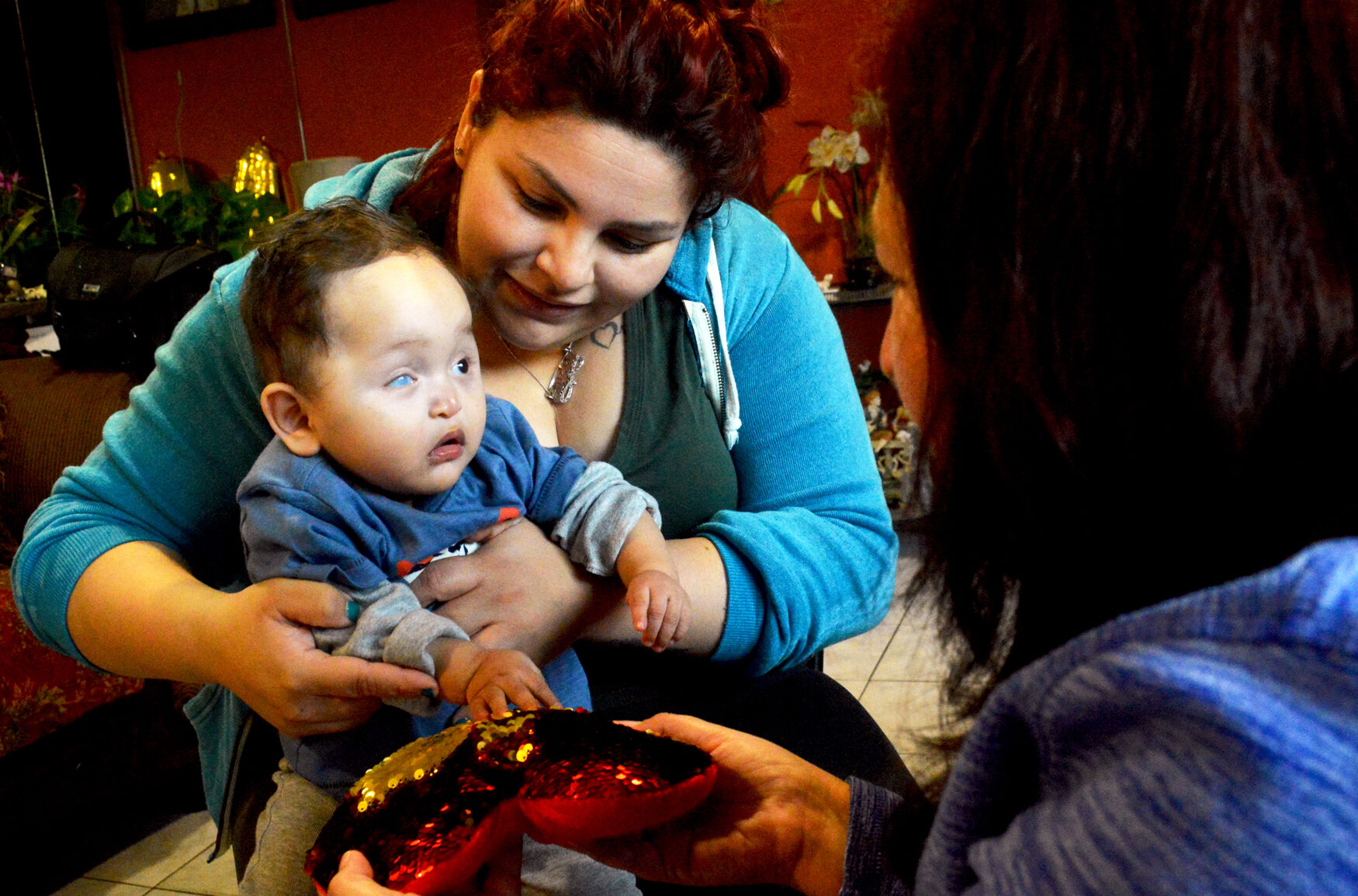 Jayden and Mom participate in an Early Intervention Session